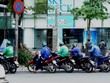 Tài xế 'xe ôm' Uber được chiêu dụ sang Grab