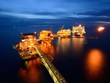 IEA cắt giảm triển vọng nhu cầu dầu toàn cầu