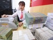 Lãi suất cứ giảm, tiền gửi cứ tăng