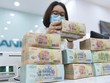 Hạ lãi suất, ngân hàng "trăn trở"
