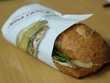 Gói bánh mì bằng giấy báo coi chừng bị phạt
