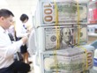 Ứng xử với tỷ giá “nhảy múa”