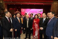 Tổng Bí thư, Chủ tịch nước Nguyễn Phú Trọng với các đại biểu tại Thành uỷ Hà Nội. (Ảnh : Trí Dũng/TTXVN).