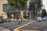 Người dân đeo khẩu trang đi bộ trên một con phố ở Singapore. Ảnh: Bloomberg.