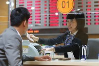 Cổ phiếu ngân hàng được hỗ trợ bởi kỳ vọng xử lý nợ xấu