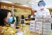 Agribank vẫn là quán quân về tổng thu nhập hoạt động trong 6 tháng đầu năm, đứng trên BIDV, Vietcombank và VietinBank. Ảnh: Đức Thanh