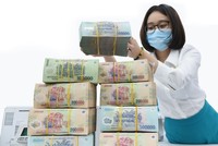 Thanh khoản dồi dào, trong khi khó cho vay, nên nhiều ngân hàng không có chính sách níu kéo khách hàng khi họ rút tiền. Ảnh: Dũng Minh