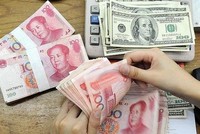 IMF nâng tỷ trọng USD, đồng nhân dân tệ vào rổ SDR