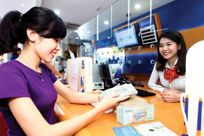 Mặt bằng lãi suất dự kiến ổn định ở mức thấp, đây là điều kiện để kích cầu tín dụng, nên nhiều ngân hàng vẫn đề ra kế hoạch tăng trưởng tín dụng ở mức cao. Ảnh: Lê Toàn