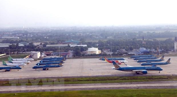 Các máy bay đỗ ở Sân bay Nội Bài. (Ảnh: Huy Hùng/TTXVN).