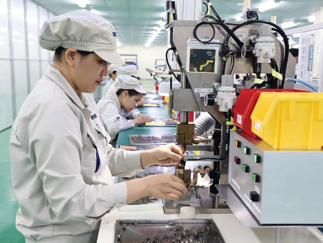 Nhiều ngành sản xuất quan trọng của nền kinh tế đã có tốc độ tăng khá cao. Trong ảnh: Sản xuất tại Công ty NMS tại Hà Nam