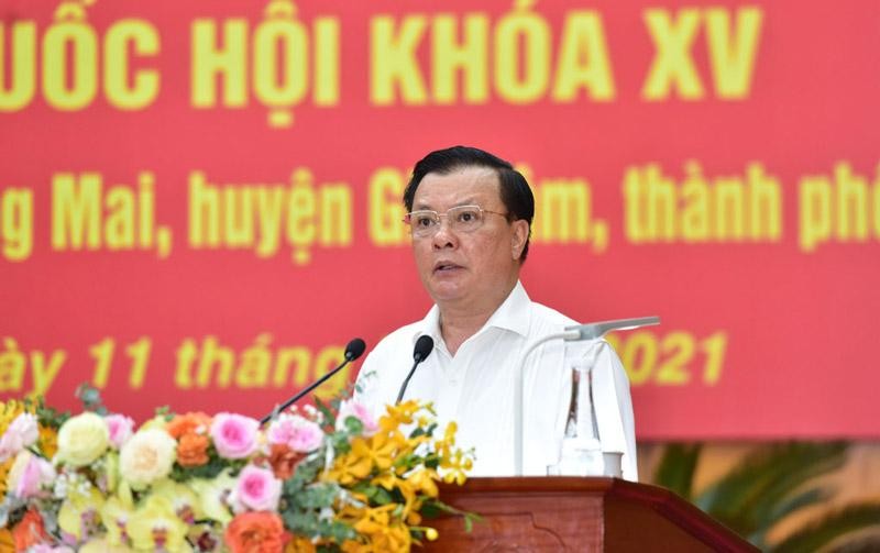 Bí thư Thành ủy Hà Nội Đinh Tiến Dũng trình bày chương trình hành động (Ảnh - Báo Hà Nội Mới).
