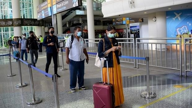 Hành khách ở sân bay Indonesia. (Nguồn: AFP/TTXVN).