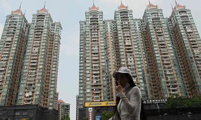 Trung Quốc đang đối mặt với làn sóng tẩy chay vay thế chấp khi người mua nhà ở khắp 22 thành phố từ chối trả các khoản vay thế chấp ở các dự án nhà ở chưa hoàn thành. Ảnh: AFP